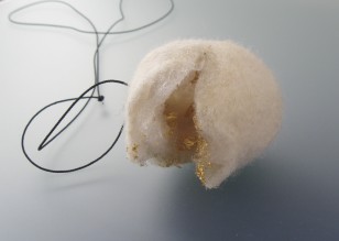 Wool, synthetic material, thread, golden flakes